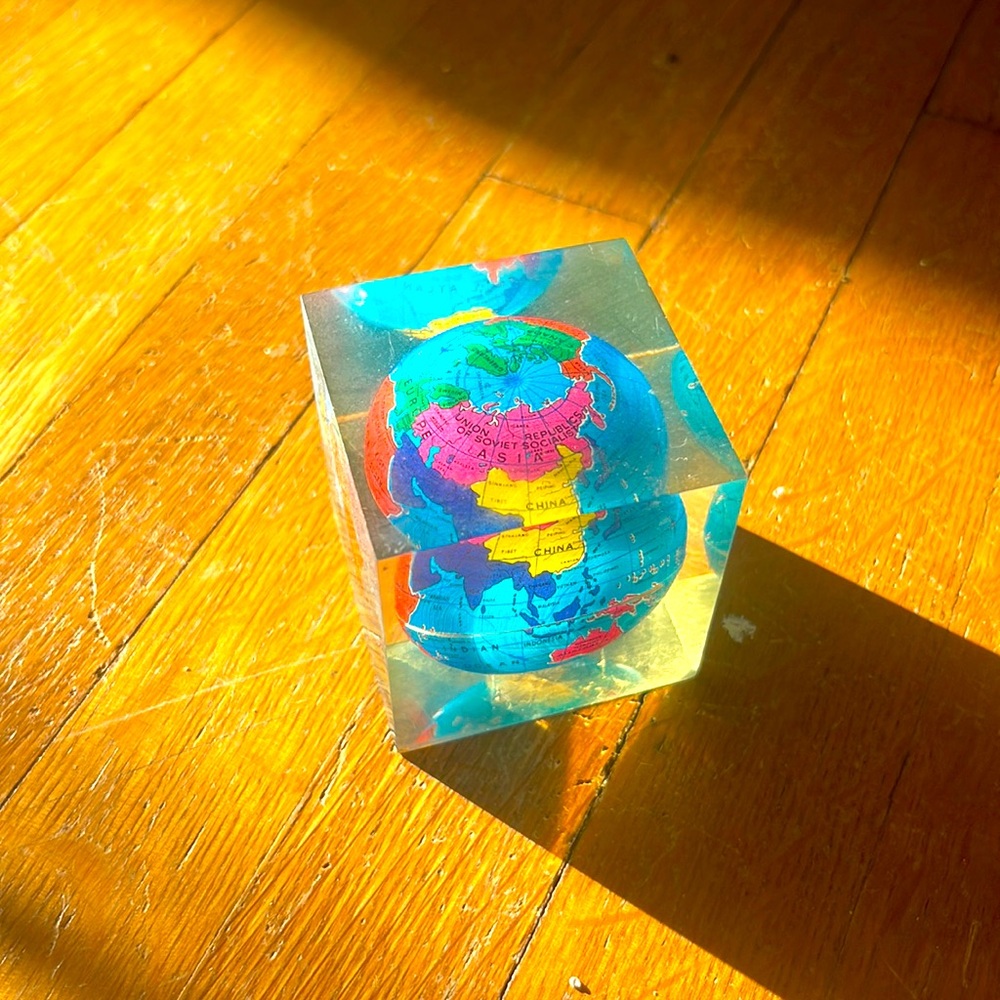 Small world globe in clear Resin
